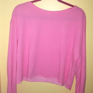 hot pink cropped sweater with wide sleeves